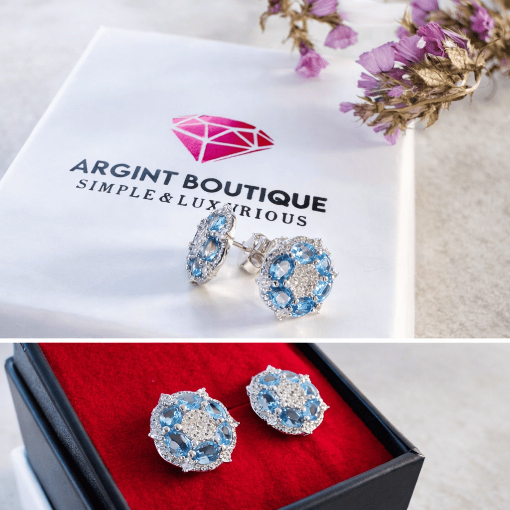 Cercei rotunzi cu cristale albastre și design floral
